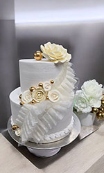 White and Cream Wedding Cake with Lace