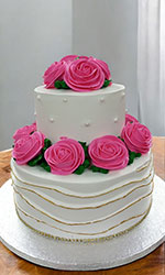 Two Tiered White with Pink Roses on Top Cake
