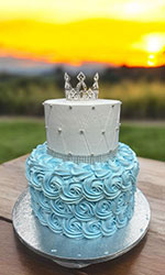 White and Baby Blue Cake with Princess Crown on Top